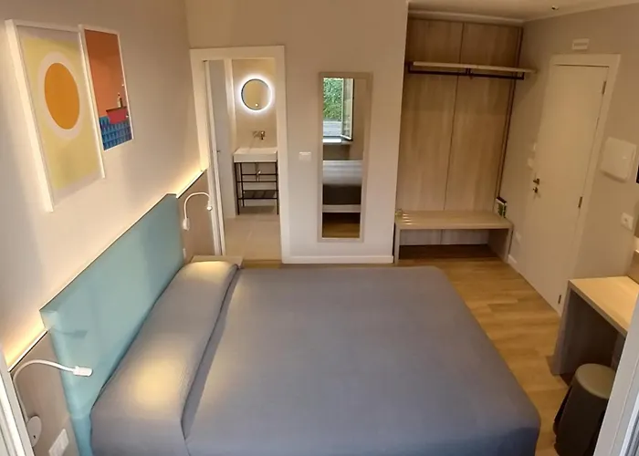 Tritone Готель